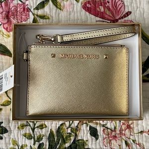 Michael Kors NWT pale gold small leather wristlet